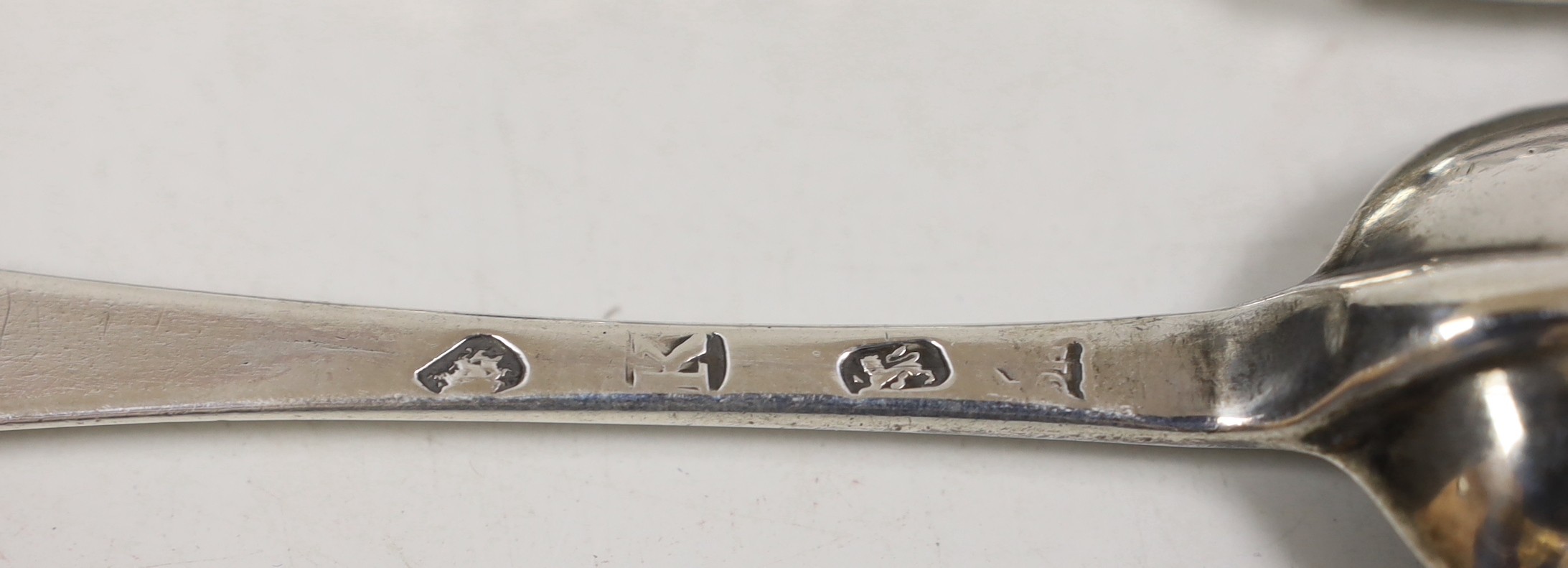 A set of seven George I silver Hanovarian rat tail pattern table spoons, Henry Clarke I, London, 1725, 19.9cm, a set of six George II silver Hanovarian pattern three pronged table forks, Isaac Callard, London, 1733, 19.2